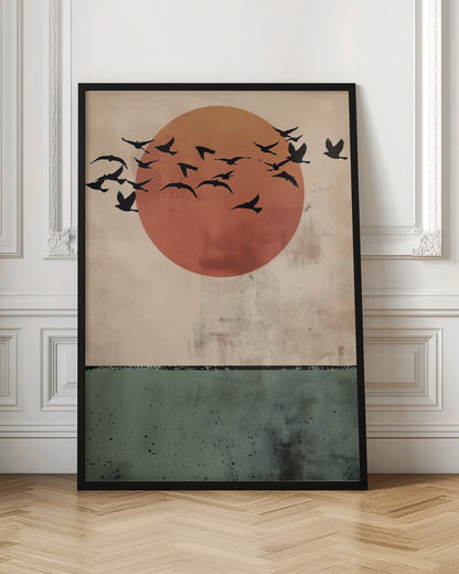 A modern art print featuring a large, textured orange-red sun against a distressed beige sky. A flock of black bird silhouettes flies across the sun. The bottom third of the image is a textured dark green panel, suggesting a minimalist landscape. The artwork is enclosed in a thin black frame. Decor