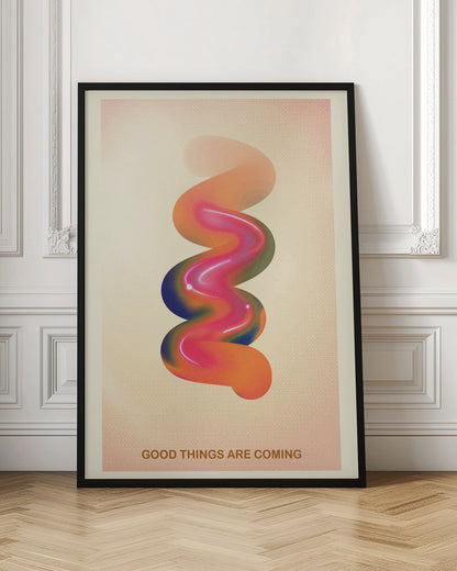 A framed modern art poster with a cream-colored, textured background. In the center is a glossy, 3D spiral shape with a vibrant color gradient of pink, orange, blue, and green. At the bottom, the motivational phrase 'GOOD THINGS ARE COMING' is printed in a simple, orange-brown font. Decor