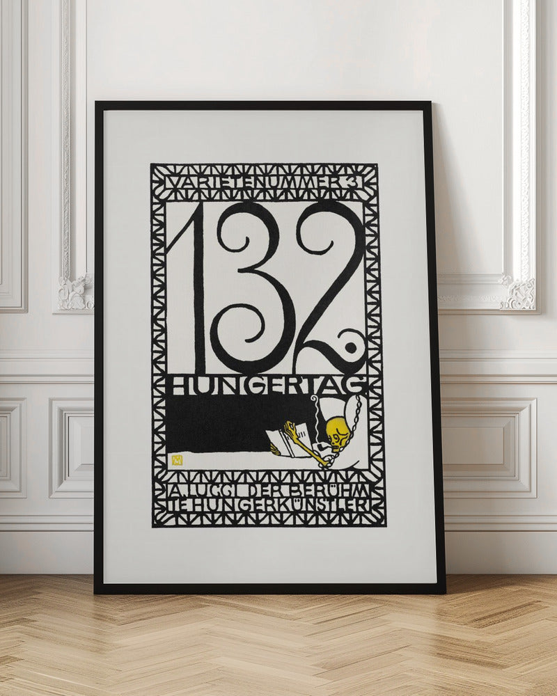 A framed vintage German art print in a graphic, woodcut style. The piece is primarily black and white with a yellow accent, featuring the large number '132' and German text like 'HUNGERTAG'. A small yellow skeleton figure is depicted reading a book and smoking a pipe, all enclosed within a geometric border. Wall Art