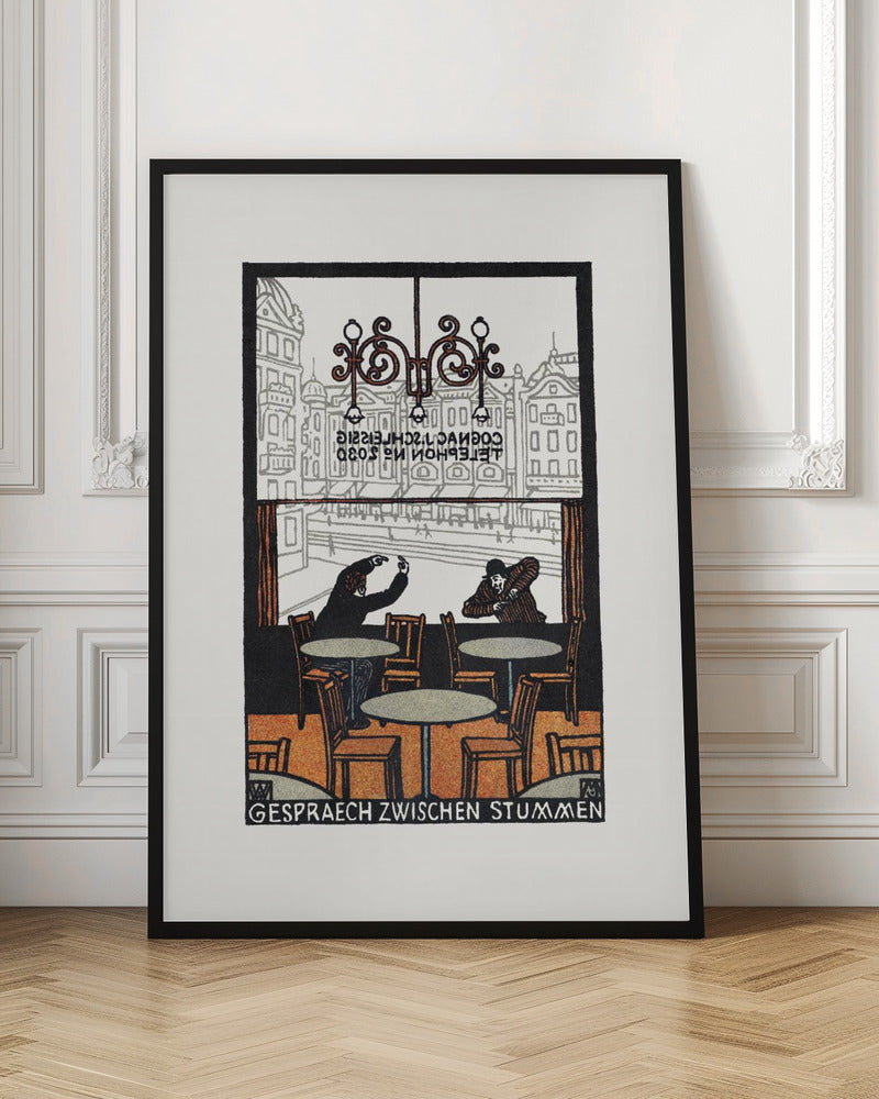 A framed vintage woodcut-style print titled 'Gespraech Zwischen Stummen', depicting the interior of a cafe. Two men sit at separate tables, communicating with exaggerated hand gestures. Through the large window behind them, a city scene with buildings is visible. Print