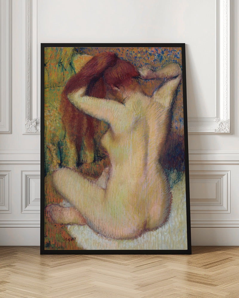 An impressionist pastel painting by Edgar Degas of a nude woman seen from the back. She is sitting on a light-colored surface, gathering her long, auburn hair with both hands behind her head. The background is a textured blend of green, yellow, and blue colors. Poster