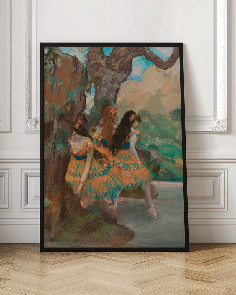An Impressionist painting by Edgar Degas of three ballet dancers resting. They are wearing vibrant orange and teal tutus and are seated under a large, textured tree trunk with a soft-focus background of green foliage and a hint of blue sky. Wall Art