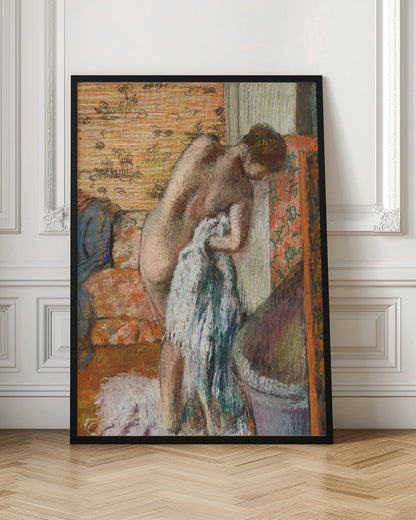 A pastel drawing in an impressionist style of a nude woman seen from the back. She is bent over, drying herself with a white and blue towel. The background is an interior with warm, patterned wallpaper in shades of orange and yellow. Print