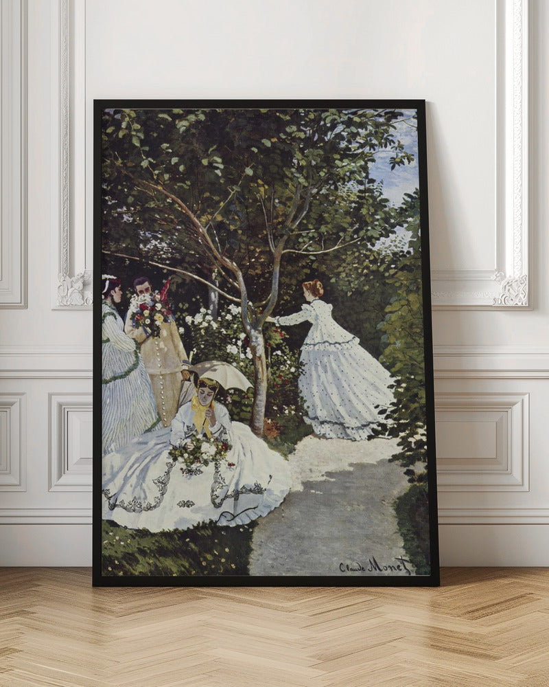 A vertical Impressionist painting by Claude Monet titled 'Women in the Garden,' depicting four figures in a lush, sun-dappled garden. In the foreground, a woman in a voluminous white dress with black embroidery sits on the grass holding flowers and a parasol. To the left, a man holds a large bouquet, partially obscuring his face, next to a woman in a striped dress. In the background, another woman in a white, polka-dotted dress reaches for a branch of a tree surrounded by white and red blossoms. Decor