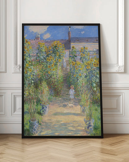 An Impressionist painting by Claude Monet titled 'The Artist's Garden at Vétheuil'. It depicts a sunny, lush garden path lined with tall, blooming sunflowers leading up to a house. A young child in a light-colored dress and straw hat stands in the foreground on the path. Artwork