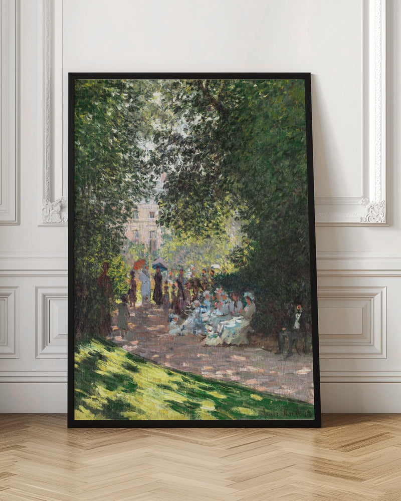 An Impressionist painting of a group of people having a luncheon in a park on a sunny day. Sunlight filters through the dense green leaves of overhead trees, creating a dappled light effect on the figures and the ground. In the background, more people stroll along a path, and a building is visible through the trees. Wall Art
