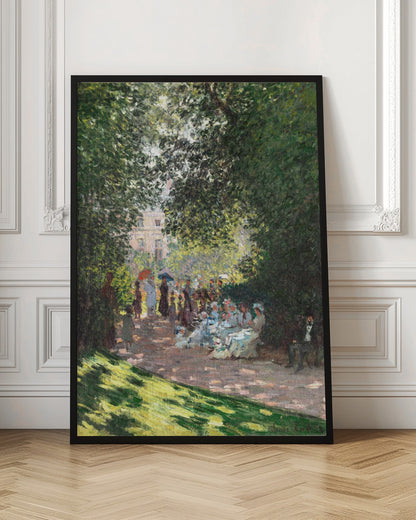 An Impressionist painting of a group of people having a luncheon in a park on a sunny day. Sunlight filters through the dense green leaves of overhead trees, creating a dappled light effect on the figures and the ground. In the background, more people stroll along a path, and a building is visible through the trees. Wall Art