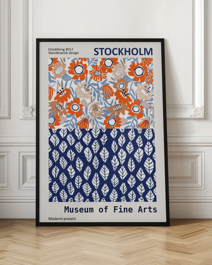 A framed exhibition poster titled 'Stockholm Museum of Fine Arts' featuring two distinct Scandinavian design patterns. The top half displays a vibrant floral pattern with orange, beige, and light blue flowers on a white background. The bottom half shows a repeating pattern of stylized white leaves on a dark blue background. Wall Art