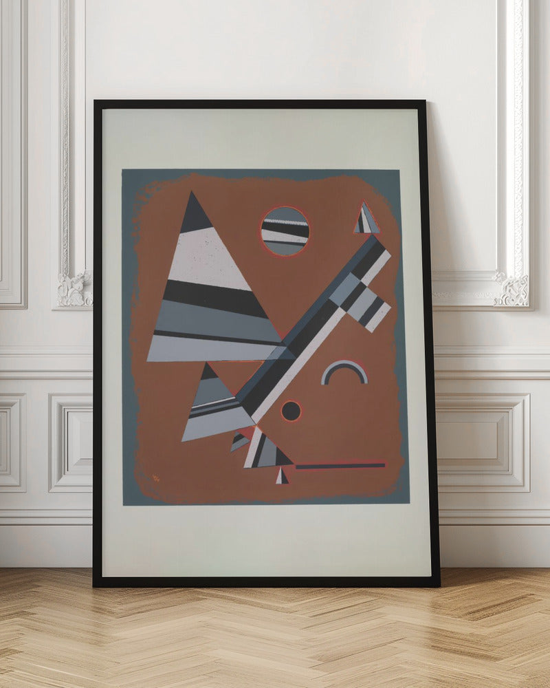 An abstract geometric artwork featuring a collection of triangles, circles, and lines in shades of grey, black, and white, set against a reddish-brown background. The piece is framed in black with a white mat. Wall Art
