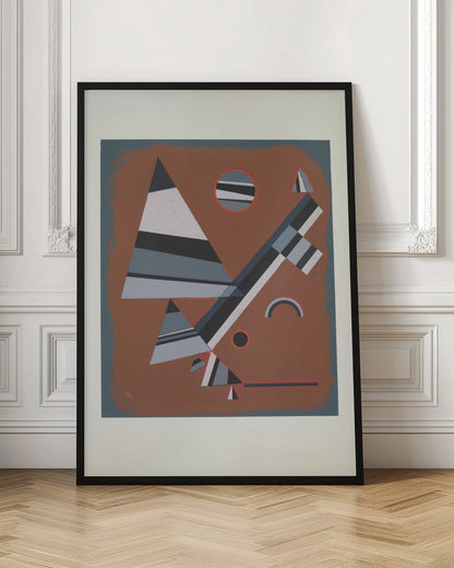 An abstract geometric artwork featuring a collection of triangles, circles, and lines in shades of grey, black, and white, set against a reddish-brown background. The piece is framed in black with a white mat. Wall Art