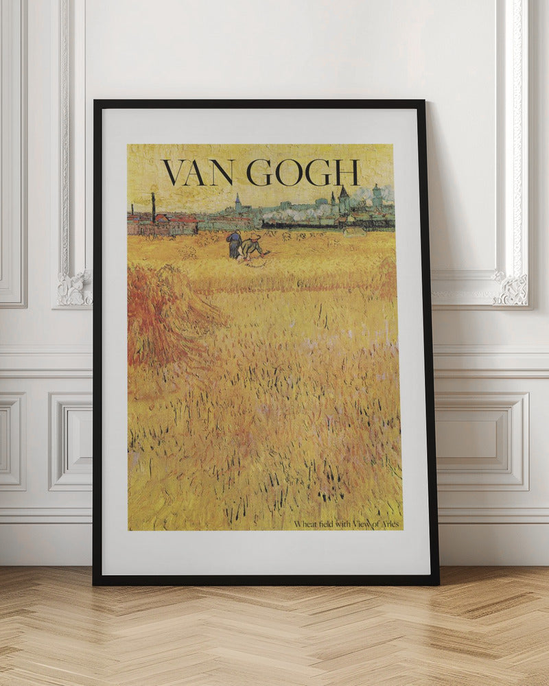 A framed poster of Vincent van Gogh's painting 'Wheat Field with View of Arles'. The impressionist artwork features a vast, textured golden wheat field with harvesters, and the city of Arles in the background. The title 'VAN GOGH' is printed prominently at the top. Decor
