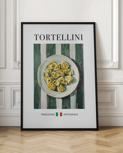 A framed vintage-style poster featuring a painted illustration of a plate of tortellini on a green and white striped background. The word 'TORTELLINI' is at the top, and 'TRADIZIONE ARTIGIANALE' with the Italian flag is at the bottom. Artwork