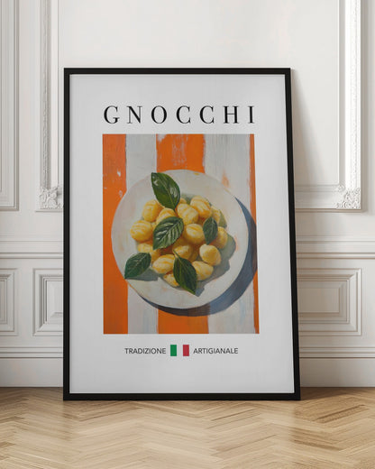 A framed poster featuring a painted illustration of a plate of gnocchi with fresh basil. The background has bold orange and white vertical stripes. The word 'GNOCCHI' is at the top, and 'TRADIZIONE ARTIGIANALE' with an Italian flag is at the bottom. Decor