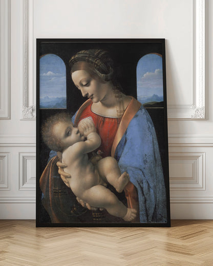A Renaissance painting of the Madonna and Child, known as 'Madonna Litta' by Leonardo da Vinci. The Virgin Mary, dressed in a red gown and blue mantle, gazes down lovingly at the infant Jesus whom she holds in her arms. The scene is set in a dark room with two arched windows that open to a serene, mountainous landscape. Artwork