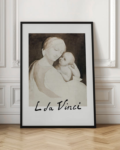 A framed poster of a Leonardo da Vinci drawing depicting the Madonna tenderly holding the infant Jesus. The piece is rendered in monochrome shades of brown and cream with the artist's signature 'L da Vinci' at the bottom. Decor