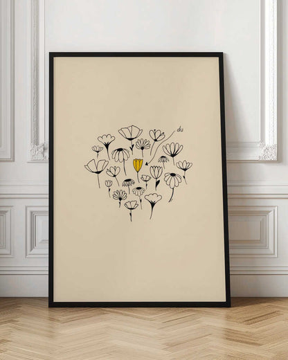 A minimalist art print with a cream-colored background and a thin black frame. In the center is a circular cluster of hand-drawn wildflowers in black ink, with one single flower colored a vibrant yellow, creating a pop of color. The style is simple and whimsical. Print