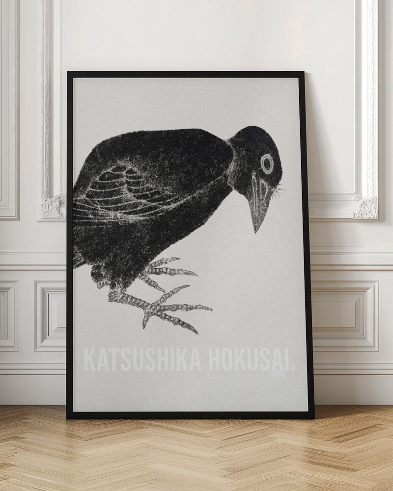 A black and white Japanese woodblock print by Katsushika Hokusai from 1814. The artwork features a stylized black crow with a textured, inky appearance, bending its head down against a light, grainy background. The piece is framed in black. Decor