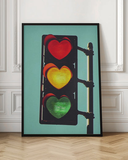 A vertical traffic light against a solid teal sky, with its red, yellow, and green signals all shaped like glowing hearts. Wall Art