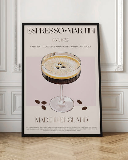 A vintage-style art print poster for an Espresso Martini. It features a detailed illustration of the cocktail in a ribbed coupe glass, garnished with three coffee beans on its foam. The background is beige and pink, with text that reads 'ESPRESSO MARTINI', 'EST. 1952', 'MADE IN ENGLAND', and a description of the drink. The poster has a thin black border. Decor