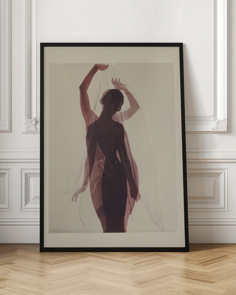 An artistic photograph of a woman in silhouette, wearing a dark dress and holding a sheer red veil above her head. A transparent, ghostly image of her in the same pose is overlaid, creating a double-exposure effect against a plain, cream-colored background. Print