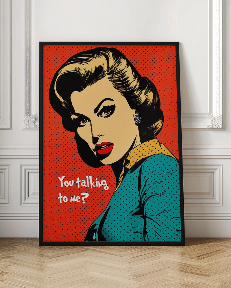 A pop art illustration of a glamorous woman with dark hair, red lips, and dramatic eyeliner, looking back over her shoulder with a challenging expression. The text 'You talking to me?' is written beside her. The background is a vibrant red with a black dot pattern, and the entire piece is enclosed in a simple black frame. Artwork