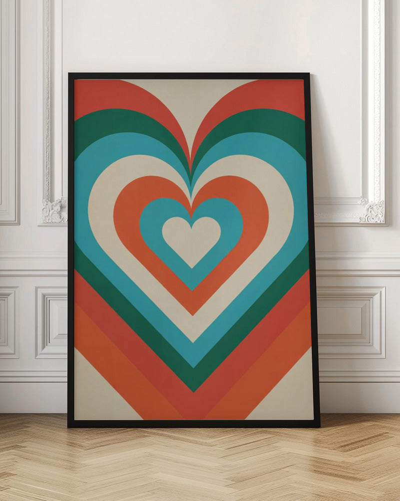 A retro-style graphic art piece featuring a large, centered heart made of concentric layers of orange, green, blue, and cream, creating a hypnotic, repeating pattern. The artwork is presented in a simple black frame. Artwork