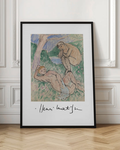 A framed art print of a painting by Henri Matisse featuring two nude figures in a pastoral landscape. One figure reclines in the grassy foreground while another sits by the water in the background. The style is loose and painterly, and the artist's signature is visible below the image on the white mat. Wall Art