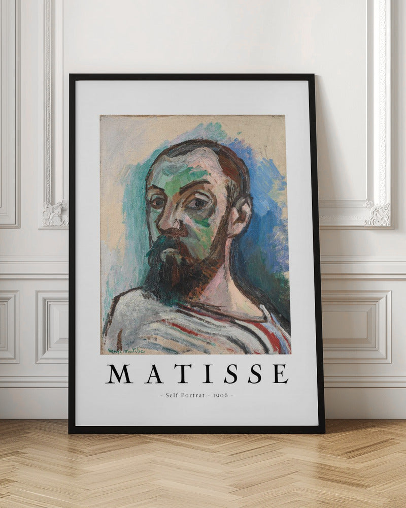 A framed art print of Henri Matisse's 'Self Portrait' from 1906. The Fauvist painting features a man with a dark beard, rendered in bold strokes of green, beige, and brown, against a vibrant blue and light green background. Below the artwork, text reads 'MATISSE - Self Portrait - 1906'. Wall Art