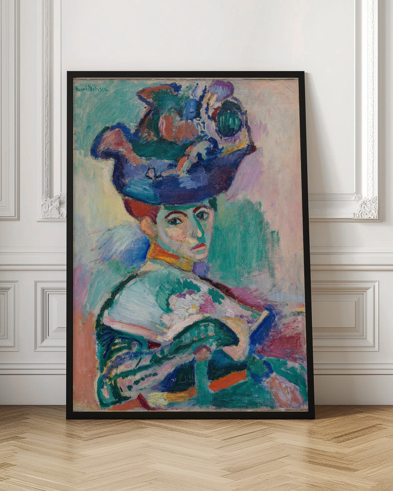 A vibrant Fauvist portrait painting by Henri Matisse of a woman with red hair wearing an elaborate, colorful blue, purple, and green hat. The painting features bold, expressive brushstrokes and non-naturalistic colors, with a background of green, pink, and yellow hues. Wall Art