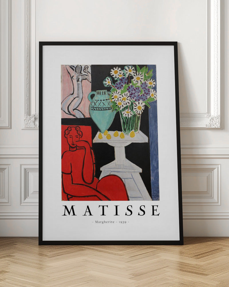A framed art poster of Henri Matisse's painting 'Margherite' from 1939. The vibrant Fauvist artwork depicts a woman in a bold red dress, a still life with a turquoise vase of daisies on a white table, and a small sketch of a nude in the background. The artist's name is printed below the image. Poster