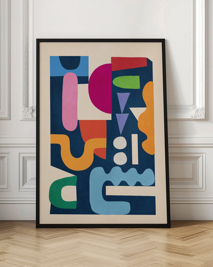 A modern abstract art print in a black frame, featuring a vibrant collage of colorful, cut-out style shapes against a dark navy blue background. The composition includes a mix of geometric and organic forms in shades of magenta, pink, orange, green, red, purple, and light blue, all contained within a cream-colored border. Print