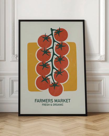 A vintage-style art print of bright red cherry tomatoes on a dark green vine, set against a mustard yellow rectangle on an off-white background. Below the image, text reads 'FARMERS MARKET' and 'FRESH & ORGANIC'. Decor