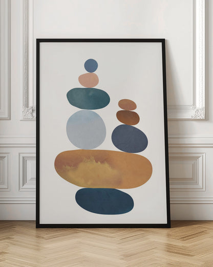 A minimalist abstract painting of two stacks of colorful, smooth stones balanced on top of each other. The color palette includes shades of blue, orange, brown, and pink against a light-colored background, enclosed in a black frame. Print