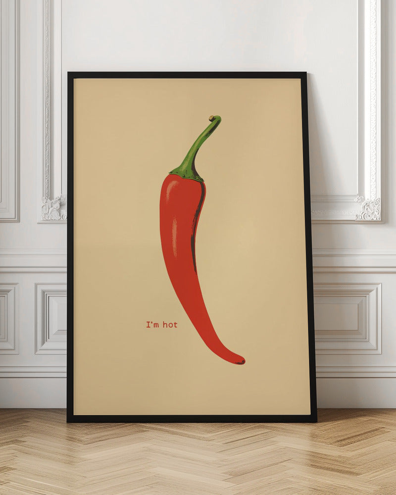 A minimalist poster in a black frame featuring a single, vibrant red chili pepper with a green stem against a cream background. Below the pepper, the text 'I'm hot' is printed in a simple font. Print