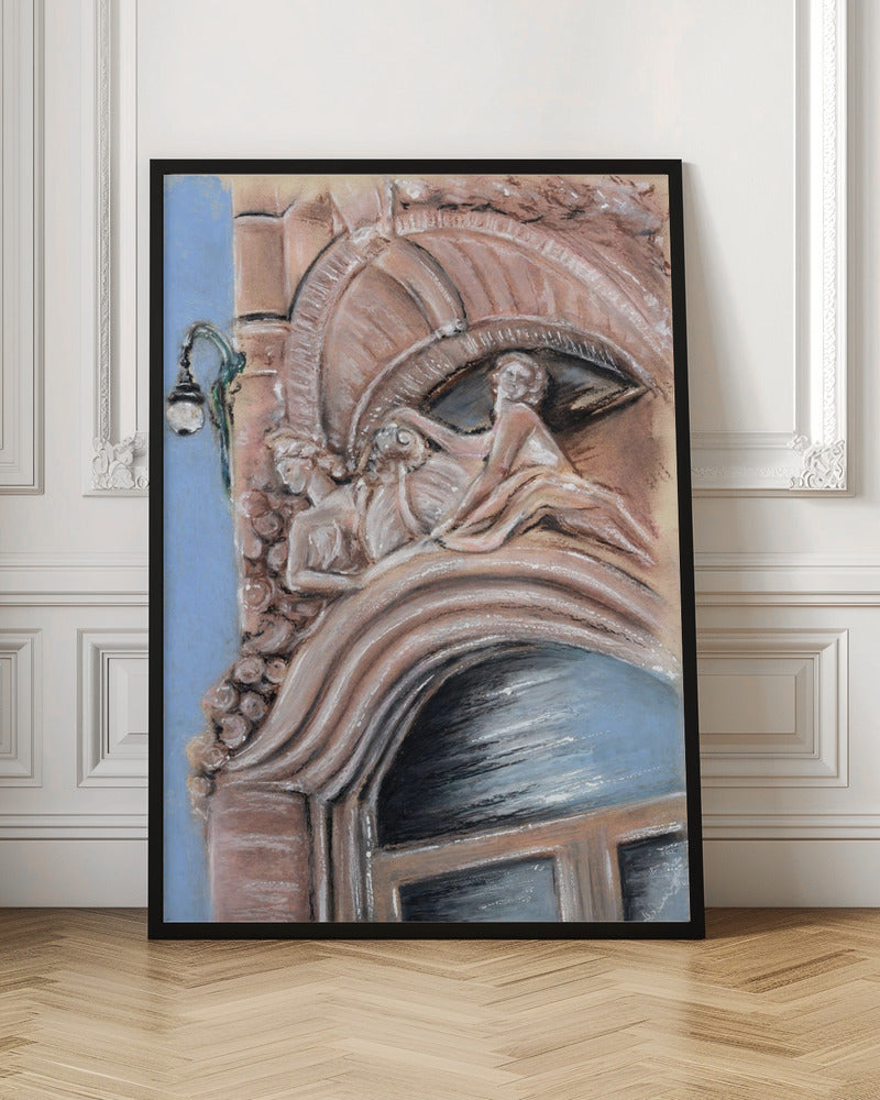 A pastel drawing of an ornate architectural detail on a building facade, featuring elaborate carvings above an arched window. The carvings depict classical female figures in flowing drapery, rendered in warm pink and brown tones against a light blue sky. A vintage-style street lamp is visible to the left. Wall Art