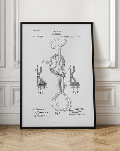 A framed black and white patent illustration for an egg beater by E. Hadley, patented April 3, 1888. The drawing includes a main view of the hand-cranked mixer and two detailed cross-section diagrams, all labeled with letters and figure numbers. Poster