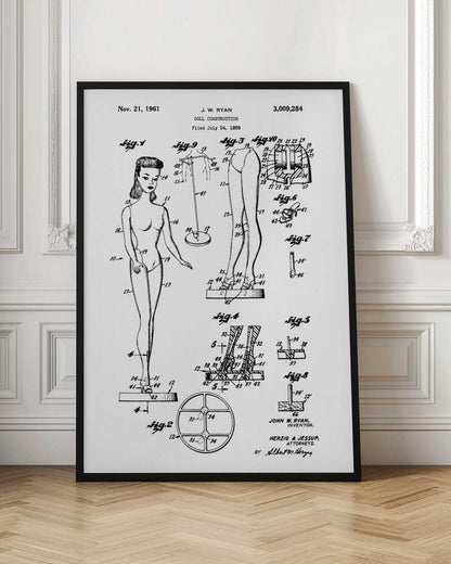 A framed black and white patent illustration for the original Barbie doll, dated November 21, 1961. The diagram, titled 'Doll Construction' by J. W. Ryan, shows various figures including a full view of the doll, cross-sections of its joints, and detailed drawings of its stand and shoes. Print