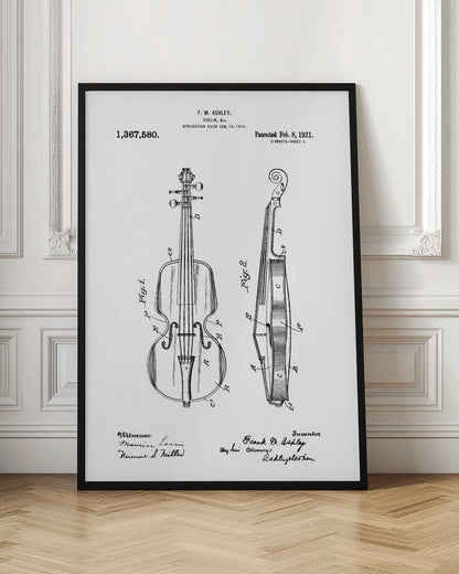 A framed black and white patent illustration for a violin from 1921. The technical drawing shows detailed front and side views of the instrument with labels, signatures, and patent information. Print