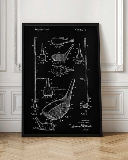 A framed black and white patent illustration of a golf club, dated 1972. The poster displays multiple technical drawings of the club head and shaft from various angles, labeled with figure numbers and part identifiers against a black background. Artwork
