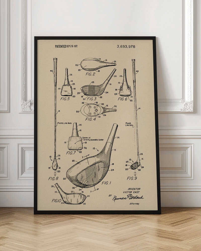 A framed vintage patent illustration for a golf club, dated September 26, 1972. The drawing, on beige paper, shows multiple detailed figures of the club's design from various angles, complete with reference numbers and labels like 'Plumb Line Axis'. Print