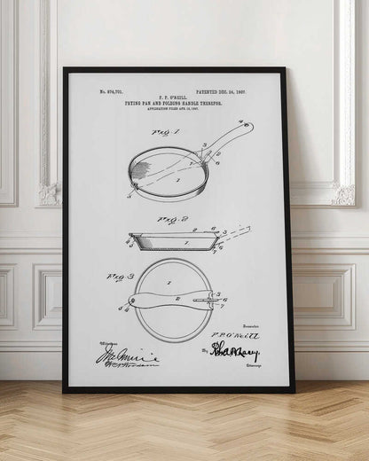 A framed patent illustration from 1907 for a frying pan with a folding handle. The black and white technical drawing shows three views of the invention, complete with labels and signatures. Wall Art