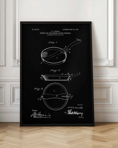 A framed vintage patent illustration from 1907 for a frying pan with a folding handle, presented as a white-on-black blueprint-style drawing. It features three detailed diagrams of the pan from different angles, along with technical text and signatures. Artwork