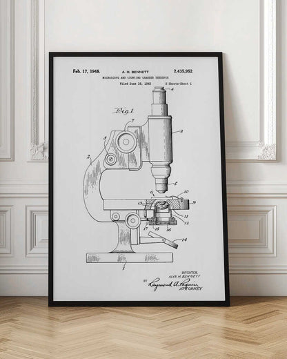 A framed patent illustration for a microscope, dated February 17, 1948. The black and white technical drawing shows a side view of the microscope with its various parts labeled with numbers. Text at the top provides patent details, and signatures are at the bottom. Wall Art