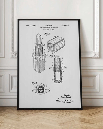 A framed black and white patent illustration for a lipstick case, dated June 17, 1952. The drawing, by inventor P. Suinat, shows detailed diagrams of the lipstick mechanism from different angles, including a perspective view, a cross-section, and a top-down view, all labeled with reference numbers. Poster