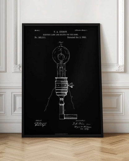 A framed black and white patent illustration for T. A. Edison's electric lamp and holder, dated October 3, 1882. The technical drawing shows a detailed schematic of an early light bulb and its base against a solid black background. Poster