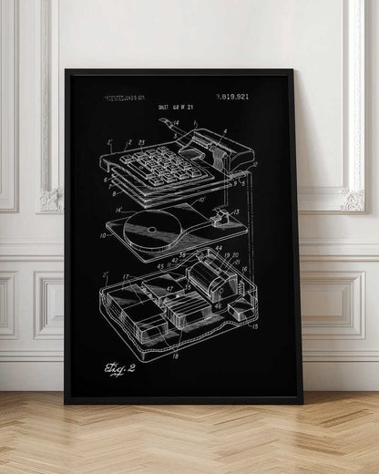 A black and white patent illustration of an electronic calculator from 1974. The image shows an exploded view of the device, detailing the keyboard and internal components with white line drawings on a black background. Wall Art