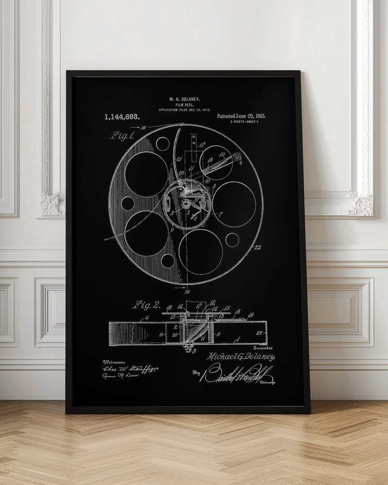 A framed black and white patent illustration for a film reel, invented by M. G. Delaney in 1912. The drawing, presented as a negative image with white lines on a black background, shows detailed schematics of the reel's mechanism from a top-down view (Fig. 1) and a cross-section (Fig. 2). Poster