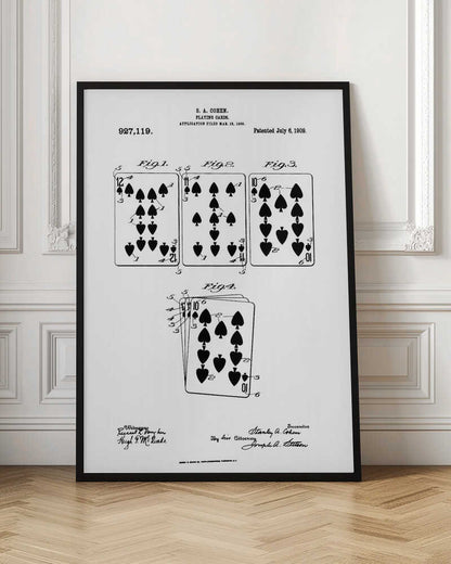 A framed, black and white patent illustration for playing cards by S. A. Cohen, patented July 6, 1909. The technical drawing displays four figures showing various spade playing cards, including a 12, 11, and 10, along with official text and signatures. Decor