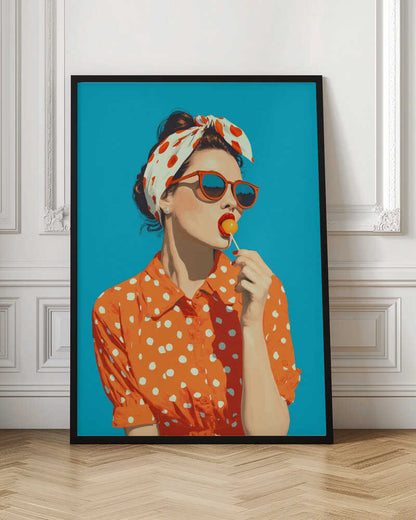A pop art style illustration of a woman in a red and white polka dot headband and orange sunglasses, licking a yellow lollipop. She is wearing an orange and white polka dot collared shirt against a solid bright blue background, all within a black frame. Artwork