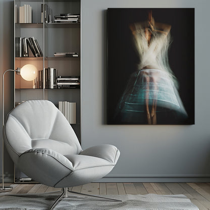 An ethereal, long-exposure photograph of a dancing figure against a dark gray background. The motion blur creates a ghostly effect, with white, gauzy fabric swirling around the upper body. The figure wears a transparent crinoline hoop skirt, revealing her legs and feet. Artwork